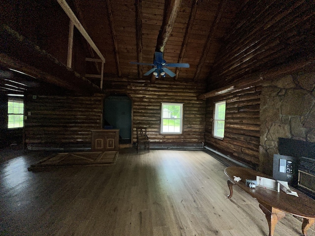 153 N Main St, East Granby, CT 06026 - unfurnished living room featuring log walls, high vaulted ceiling, hardwood / wood-style floors, a ceiling fan, and wood ceiling with exposed beams