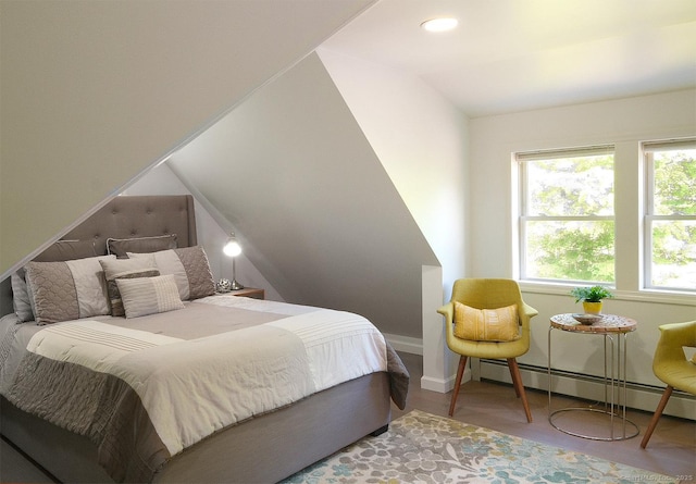 21 Perry St, Salisbury, CT 06039 - bedroom featuring baseboard heating, baseboards, vaulted ceiling, and recessed lighting