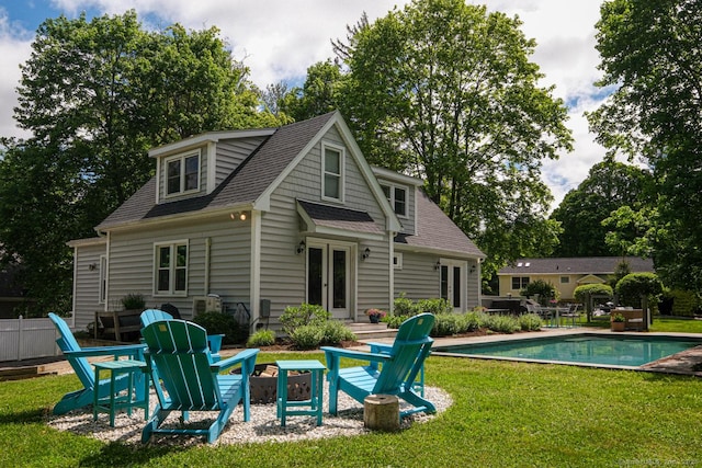 21 Perry St, Salisbury, CT 06039 - rear view of property featuring an outdoor pool, french doors, a shingled roof, and a yard