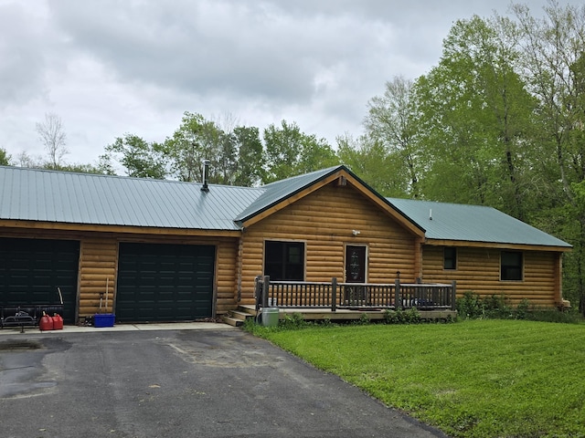 80 John Mack Rd, Hampton, CT 06247 - view of front facade featuring a front yard, asphalt driveway, an attached garage, metal roof, and log veneer siding