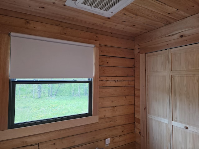 80 John Mack Rd, Hampton, CT 06247 - unfurnished bedroom featuring wood walls, multiple windows, a closet, and wooden ceiling