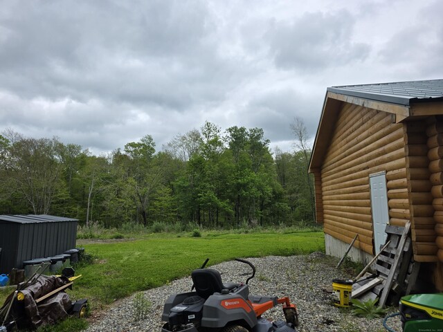 80 John Mack Rd, Hampton, CT 06247 - view of green lawn with an outbuilding and a view of trees