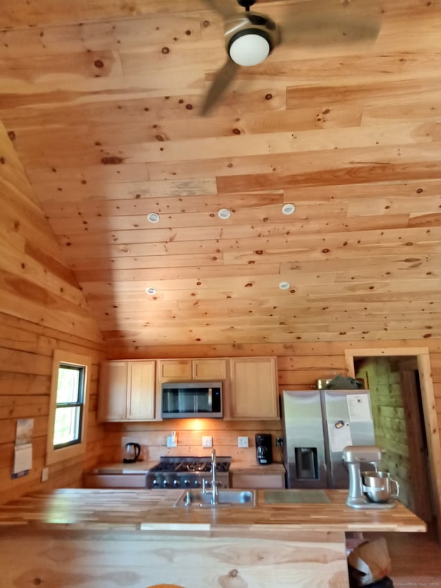 80 John Mack Rd, Hampton, CT 06247 - kitchen featuring stainless steel appliances, wooden ceiling, a sink, vaulted ceiling, and wood walls