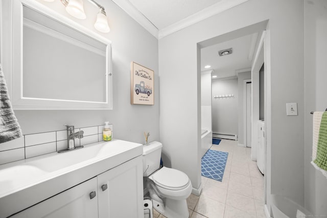 18 Kimberly Dr, Enfield, CT 06082 - bathroom featuring baseboard heating, ornamental molding, toilet, vanity, and tile patterned floors