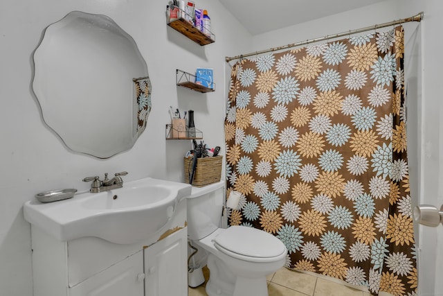 239 Glen St, New Britain, CT 06051 - full bathroom with vanity, tile patterned floors, toilet, and a shower with shower curtain