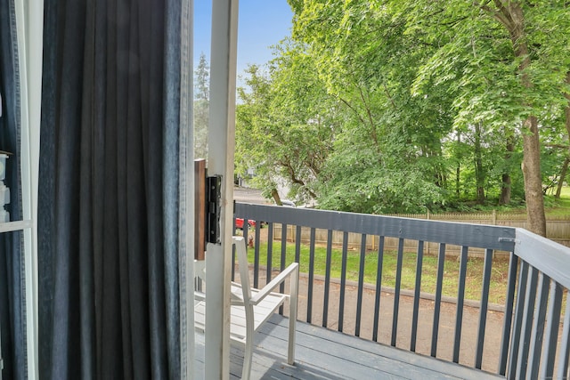 239 Glen St, New Britain, CT 06051 - view of wooden balcony featuring a deck
