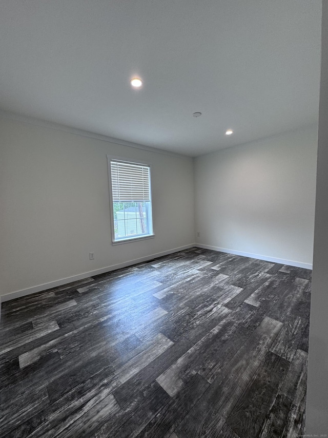 7 Middle Ter, Vernon, CT 06066 - empty room featuring dark wood-type flooring, baseboards, recessed lighting, and ornamental molding