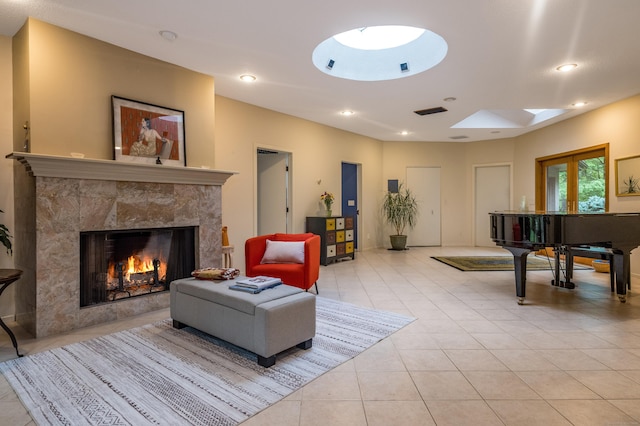 291 Peddlers Rd, Guilford, CT 06437 - living area featuring a skylight, a high end fireplace, light tile patterned floors, and recessed lighting