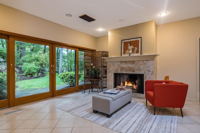 291 Peddlers Rd, Guilford, CT 06437 - living area featuring tile patterned floors and a premium fireplace