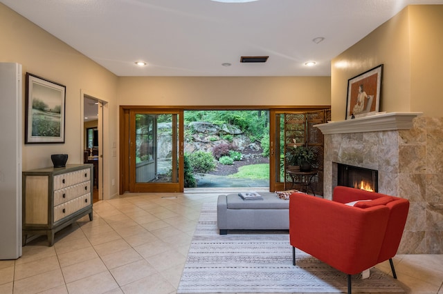 291 Peddlers Rd, Guilford, CT 06437 - living area with a fireplace, light tile patterned flooring, and recessed lighting