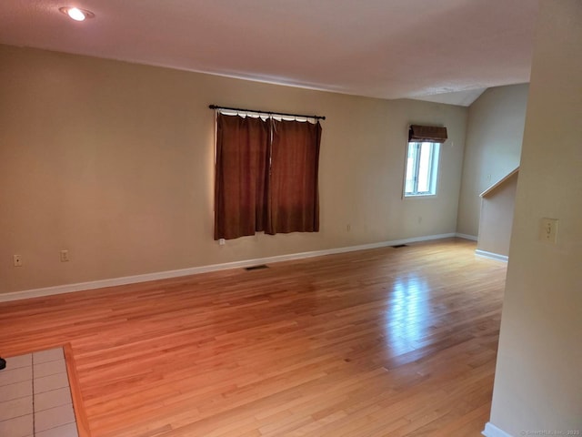 605 Whetstone Mls Unit 605, Killingly, CT 06241 - spare room featuring light wood finished floors, baseboards, and recessed lighting