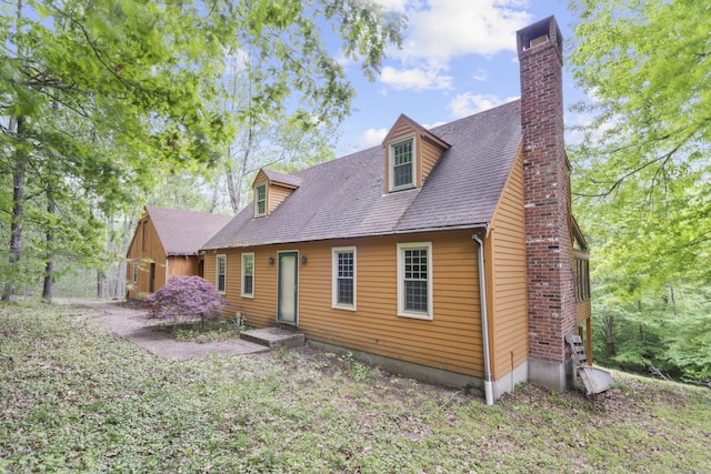 172 Parker Hill Rd, Killingworth, CT 06419 - rear view of property with a chimney