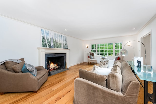 1208 Smith Ridge Rd, New Canaan, CT 06840 - living area featuring crown molding, light wood-style floors, a fireplace with flush hearth, baseboards, and recessed lighting