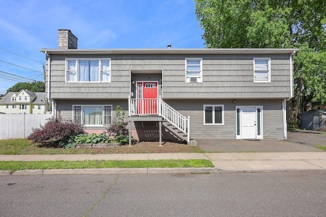 5 Stevens St, Bridgeport, CT 06606 - view of front of property with a chimney