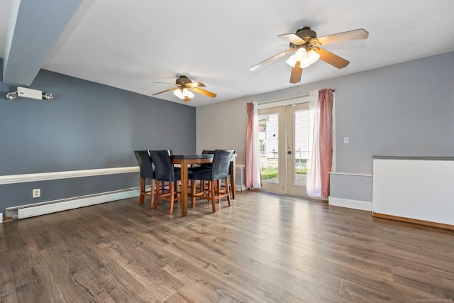 5 Stevens St, Bridgeport, CT 06606 - dining space with a baseboard heating unit, a ceiling fan, wood finished floors, and baseboards