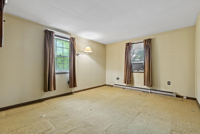108 Gallivan Ln, Montville, CT 06382 - spare room featuring a baseboard heating unit, plenty of natural light, and carpet floors