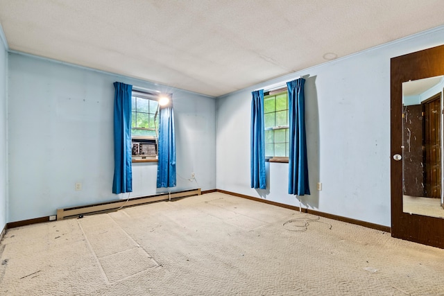 108 Gallivan Ln, Montville, CT 06382 - empty room featuring a baseboard heating unit, carpet floors, baseboards, and a textured ceiling
