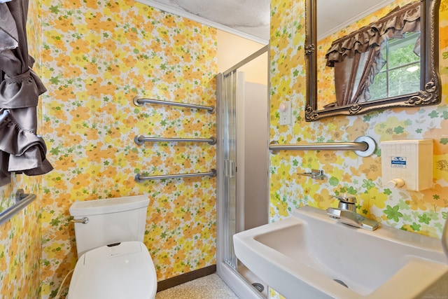 108 Gallivan Ln, Montville, CT 06382 - bathroom with wallpapered walls, a sink, a shower stall, toilet, and crown molding