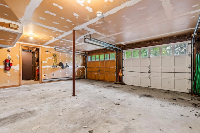 108 Gallivan Ln, Montville, CT 06382 - garage featuring baseboard heating
