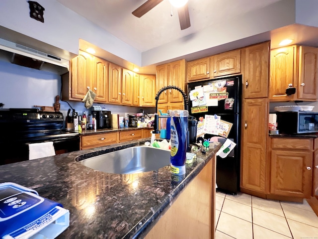 29 Hooker Rd, Bridgeport, CT 06610 - kitchen with black appliances, a ceiling fan, a sink, light tile patterned floors, and dark stone countertops