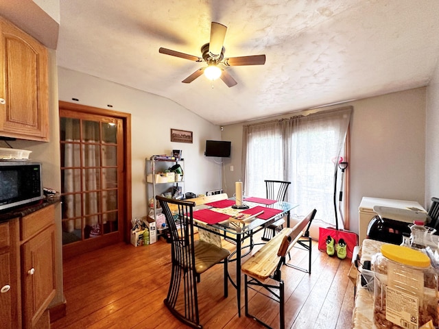 29 Hooker Rd, Bridgeport, CT 06610 - dining area featuring a ceiling fan, light wood finished floors, and vaulted ceiling