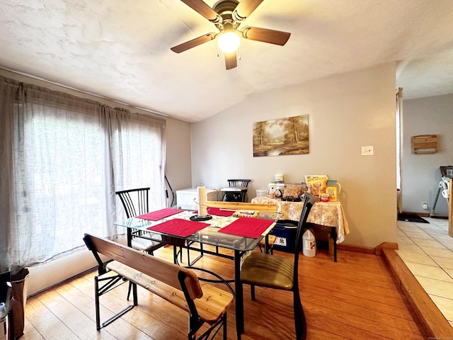 29 Hooker Rd, Bridgeport, CT 06610 - dining space with light wood-style flooring, a ceiling fan, vaulted ceiling, and baseboards