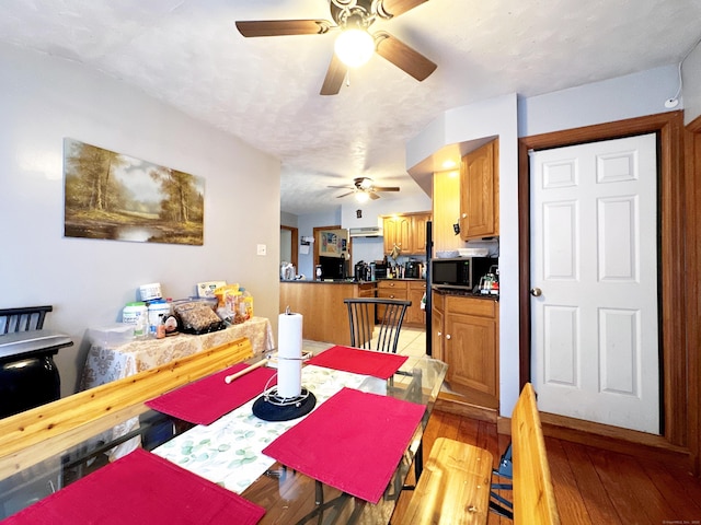 29 Hooker Rd, Bridgeport, CT 06610 - dining room with a ceiling fan and light wood-style flooring