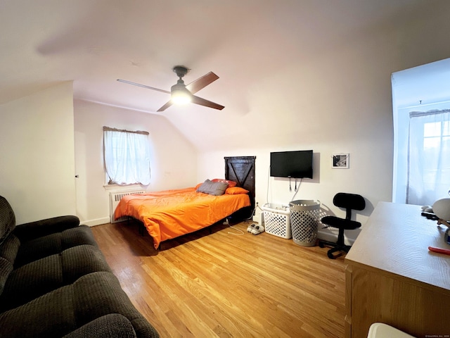 29 Hooker Rd, Bridgeport, CT 06610 - bedroom with radiator, wood finished floors, lofted ceiling, and ceiling fan