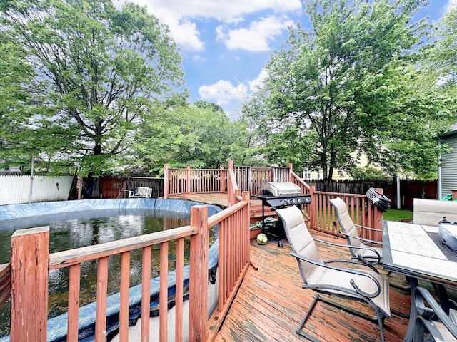29 Hooker Rd, Bridgeport, CT 06610 - deck featuring a fenced backyard and outdoor dining space