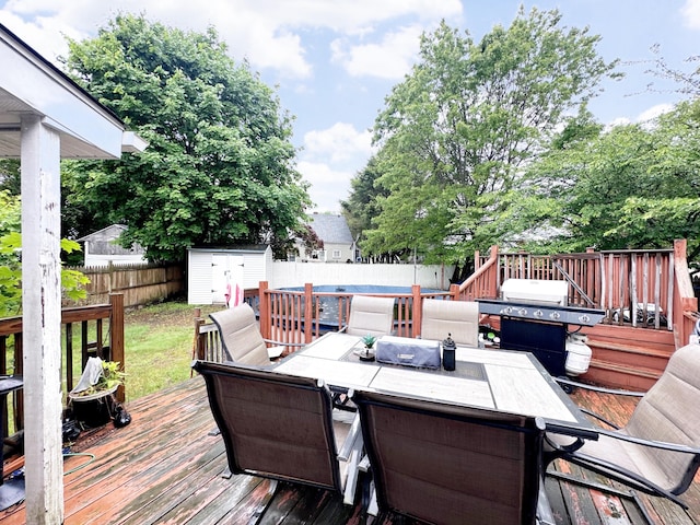 29 Hooker Rd, Bridgeport, CT 06610 - deck featuring outdoor dining space, a fenced backyard, and area for grilling