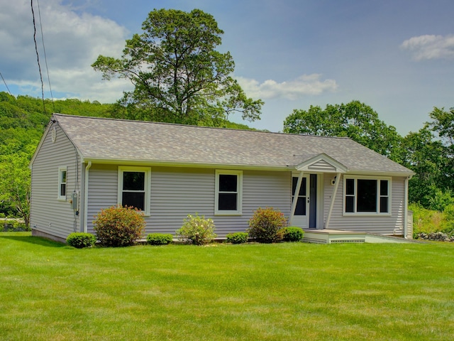 33 Homestead Rd, Ledyard, CT 06339 - ranch-style home with a front yard and roof with shingles
