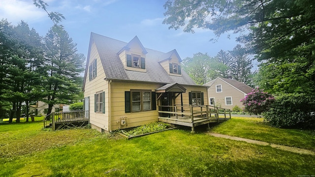 19 Weymouth Rd, Enfield, CT 06082 - rear view of house featuring a deck and a lawn
