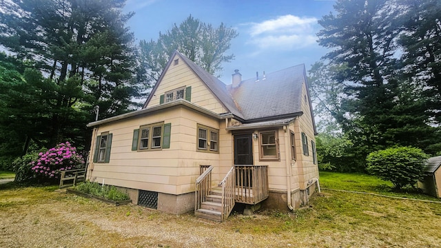 19 Weymouth Rd, Enfield, CT 06082 - rear view of property with a chimney