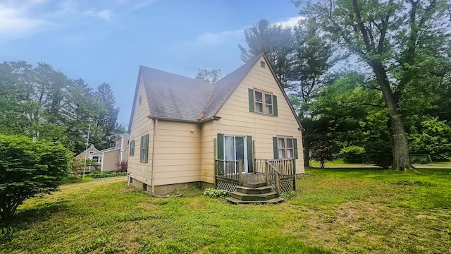 19 Weymouth Rd, Enfield, CT 06082 - rear view of house with a lawn, a wooden deck, and roof with shingles