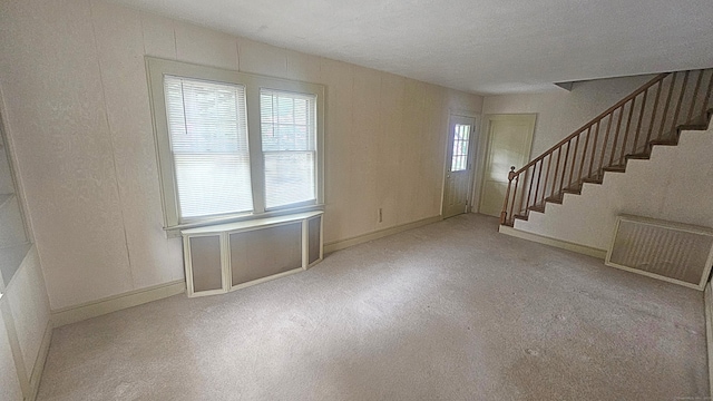 19 Weymouth Rd, Enfield, CT 06082 - carpeted foyer entrance featuring stairway and baseboards