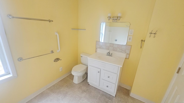 19 Weymouth Rd, Enfield, CT 06082 - bathroom featuring vanity, toilet, and baseboards