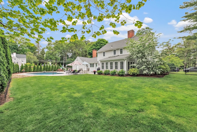 59 Ledyard Rd, West Hartford, CT 06117 - view of yard with a patio area and view of scattered trees