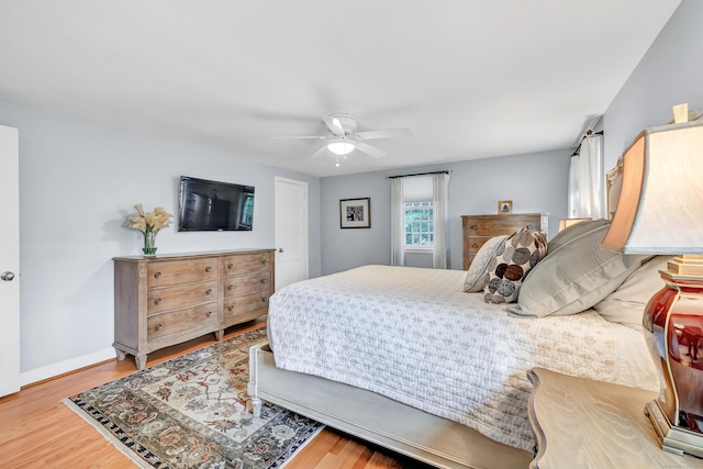 59 Ledyard Rd, West Hartford, CT 06117 - bedroom featuring wood finished floors, a ceiling fan, and baseboards