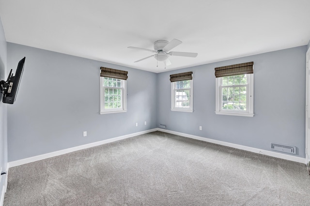 59 Ledyard Rd, West Hartford, CT 06117 - carpeted empty room featuring plenty of natural light, a ceiling fan, and baseboards
