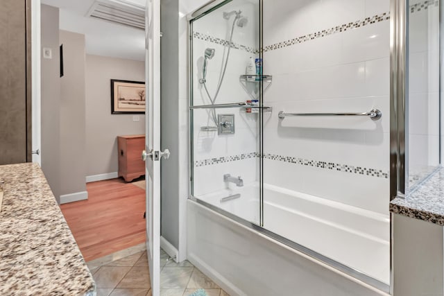 59 Ledyard Rd, West Hartford, CT 06117 - bathroom with combined bath / shower with glass door, baseboards, and vanity