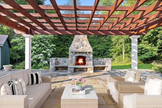 96 Norrans Ridge Dr, Ridgefield, CT 06877 - view of patio / terrace with an outdoor living space with a fireplace
