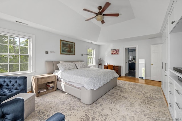 96 Norrans Ridge Dr, Ridgefield, CT 06877 - bedroom with a raised ceiling, light wood-type flooring, and ceiling fan