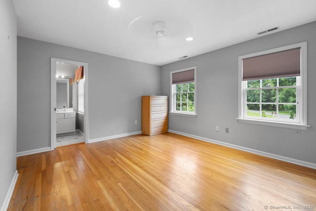 96 Norrans Ridge Dr, Ridgefield, CT 06877 - unfurnished bedroom with light wood-style floors, recessed lighting, and ensuite bathroom