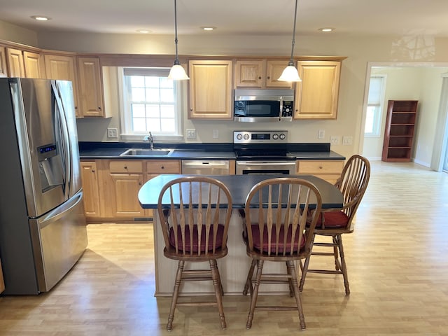4 Cedar Grove Rd, Southington, CT 06489 - kitchen featuring appliances with stainless steel finishes, a sink, dark countertops, light wood-style flooring, and recessed lighting