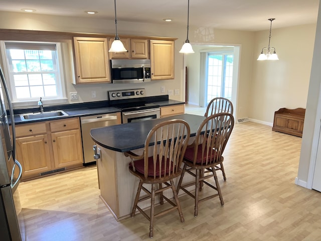 4 Cedar Grove Rd, Southington, CT 06489 - kitchen featuring stainless steel appliances, a sink, dark countertops, light wood finished floors, and recessed lighting