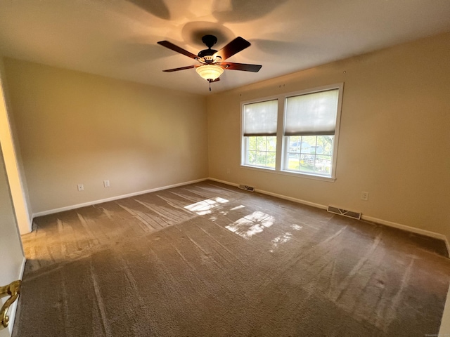 4 Cedar Grove Rd, Southington, CT 06489 - spare room with dark colored carpet, baseboards, and a ceiling fan