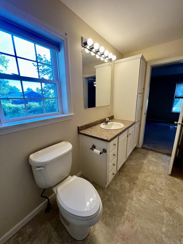 4 Cedar Grove Rd, Southington, CT 06489 - bathroom with toilet, vanity, and baseboards