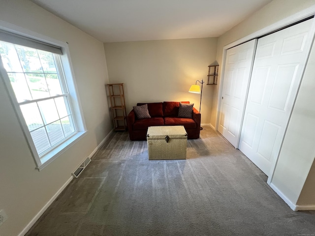 4 Cedar Grove Rd, Southington, CT 06489 - sitting room with healthy amount of natural light, carpet flooring, and baseboards