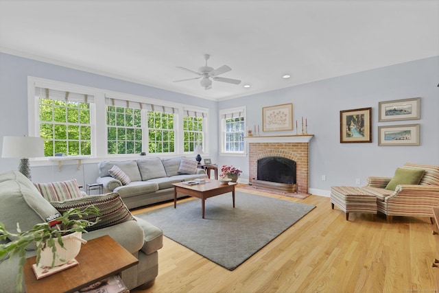 14 Withe Pass, Burlington, CT 06013 - living area with a ceiling fan, ornamental molding, wood finished floors, a fireplace, and baseboards
