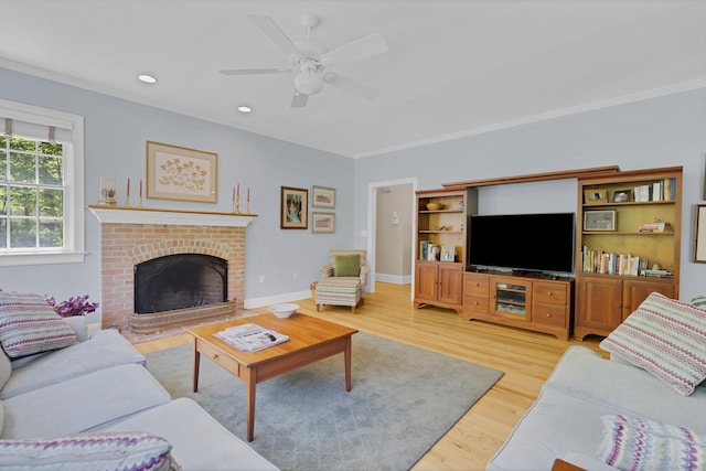 14 Withe Pass, Burlington, CT 06013 - living room featuring ornamental molding, ceiling fan, light wood-style floors, a brick fireplace, and recessed lighting